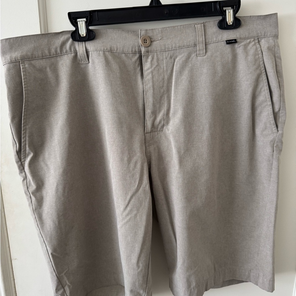 1 pair of Travis Mathew Switchback Shorts 38 with 9 in inseam.